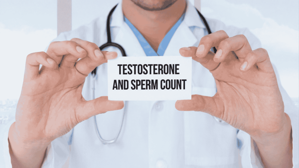Doctor-showing-notecard-of-testosterone-and-sperm-count