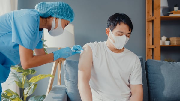 a-man-receiving-flu-vaccine